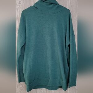 White burch boutique brand cow neck sweater with pockets and side slits.